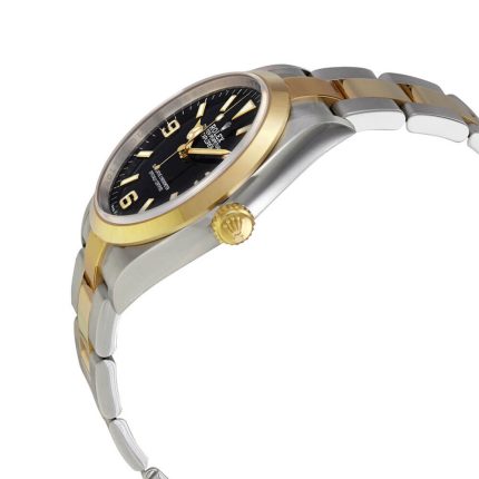 Rolex Explorer 124273 black dial yellow gold bezel two tone side profile view